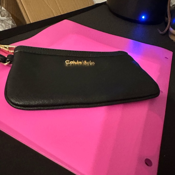 Calvin Klein Black Pouch with Gold Accent - Picture 1 of 7